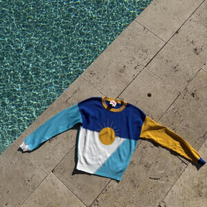 Solid & Striped Color Block Crew Neck Sweater with Sun Motif